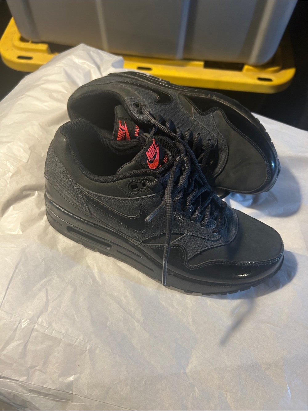 Nike Men's Black Sneakers with Red Logo Accent
